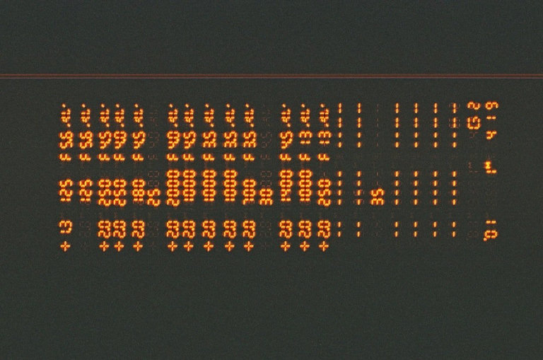 Close-up of retro programming code with numbers and technical symbols