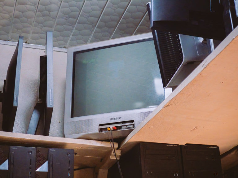 Vintage CRT computer monitor and keyboard from the early 1990s DOS era
