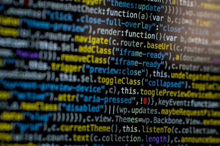 Web developer working on code with browser development tools open